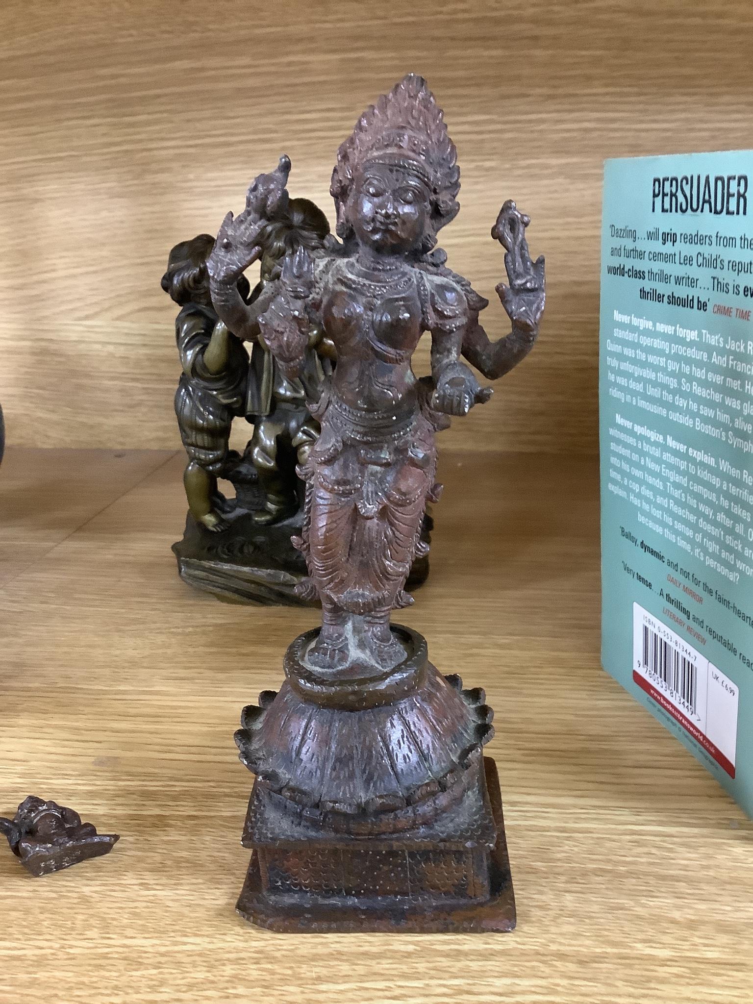 A bronze group of two children and two Indian bronze figures, tallest 20cm